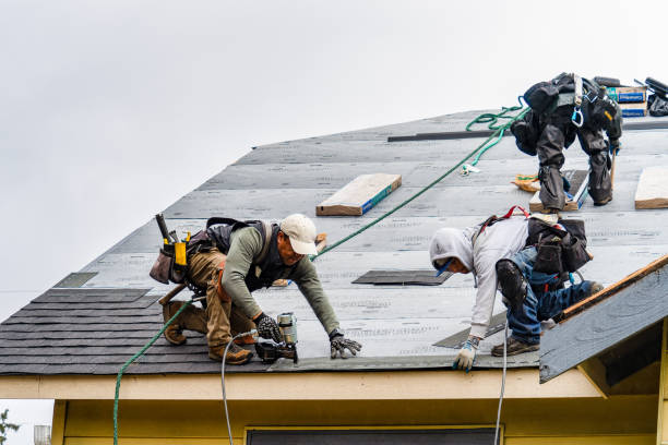 Professional Gutter Installation technician working in Hurley, SD